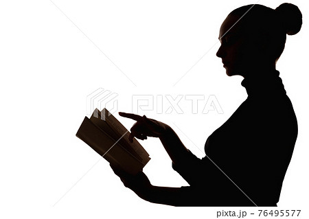 woman silhouette education teacher reading book 76495577