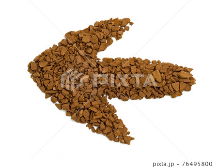 Instant coffee powder with arrow shape isolated on white background Instant coffee powder with arrow shape isolated on white background 76495800