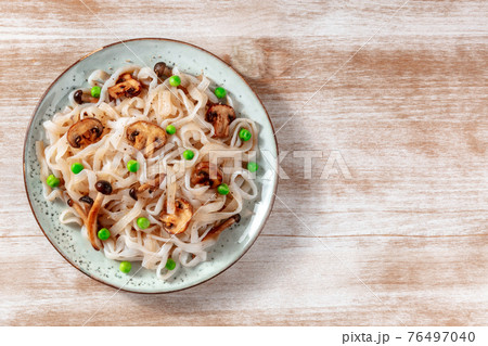 Konjac pasta with vegetables, shot from above with copy space Konjac pasta with vegetables, shot from above with copy space 76497040
