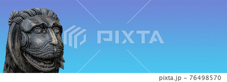 Banner with an ancient statue of Sphinx at blue sky gradient background with copy space. Concept of mythology and historical heritage of European Middle Age. 76498570