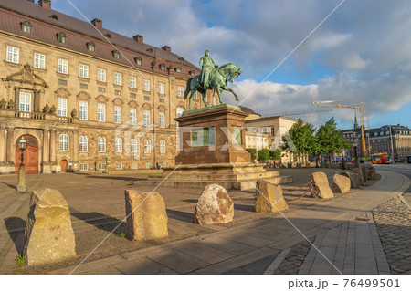 Christiansborg Palace and statue of Christian IX illuminated in early morning, Copenhagen, Denmark Christiansborg Palace and statue of Christian IX illuminated in early morning, Copenhagen, Denmark 76499501