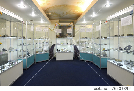 Stands with minerals and handworks of stone exposed for customers. The boutique 76503899