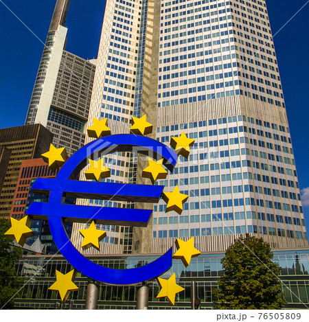 Symbol of Euro currency in front of skyscraper in financial downtown of Frankfurt, Germany, Symbol of Euro currency in front of skyscraper in financial downtown of Frankfurt, Germany, 76505809