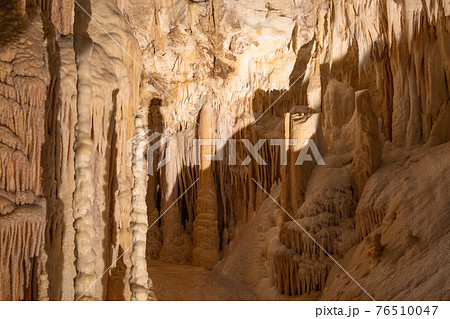 Stalactite and Stalagmite formations into the Frasassi Caves (Grotte di Frasassi) Stalactite and Stalagmite formations into the Frasassi Caves (Grotte di Frasassi) 76510047