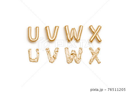 Inflated, deflated gold U V W X letters, balloon font 76511205