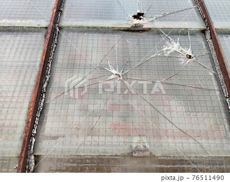 gun bullet broken window glass gun bullet broken window glass 76511490