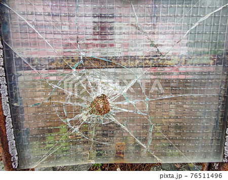 gun bullet broken window glass gun bullet broken window glass 76511496