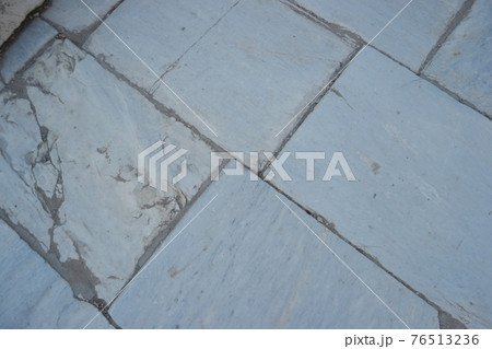 Antique marble road surface. Textured background of marble. 76513236
