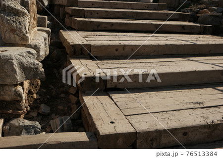 Ancient staircase architecture. Vintage wooden staircase background. Ancient staircase architecture. Vintage wooden staircase background. 76513384