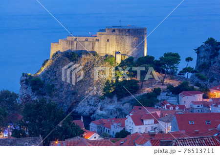 Dubrovnik. Scenic view of the city in lights from the air at sunset. 76513711