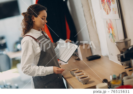 Cup Taster Girl Tasting Degustation Coffee Quality Test. Coffee Cupping 76515631