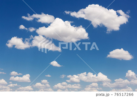 many white clouds of interesting shapes, against a blue sky, arranged chaotically, landscape many white clouds of interesting shapes, against a blue sky, arranged chaotically, landscape 76517266