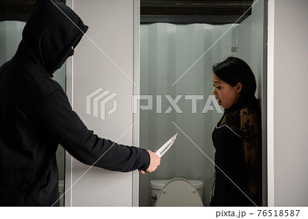 thief threaten knife to shock woman in toilet thief threaten knife to shock woman in toilet 76518587
