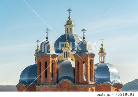 Domes Europe, Orthodox and Catholic Church. Close-up, against the background of the sky. 76519693