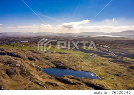 Aerial view of Lough Free at Dunmore Head by Portnoo in County Donegal, Ireland. 76520249