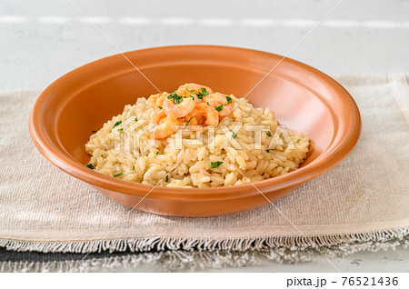 Portion of risotto with prawn Portion of risotto with prawn 76521436