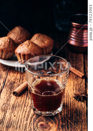 Turkish coffee with spices and muffins Turkish coffee with spices and muffins 76523003