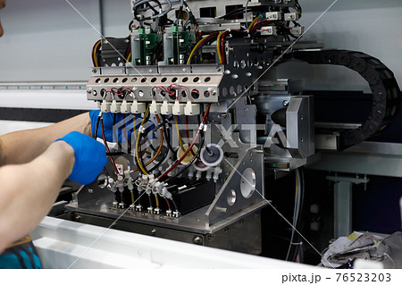 maintenance work on large format fabric printer 76523203