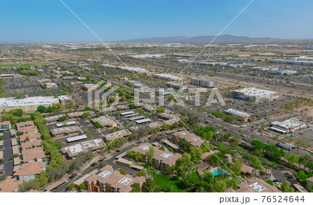 Aerial view of residential district at suburban with mixed new development a Avondale near Phoenix Arizona USA 76524644