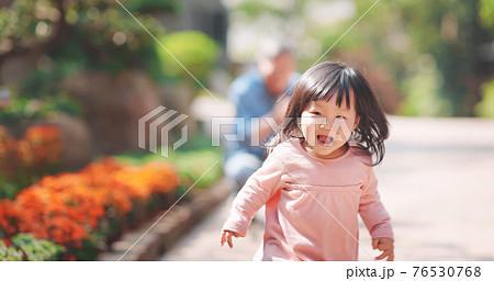 asian senior man with granddaughter 76530768