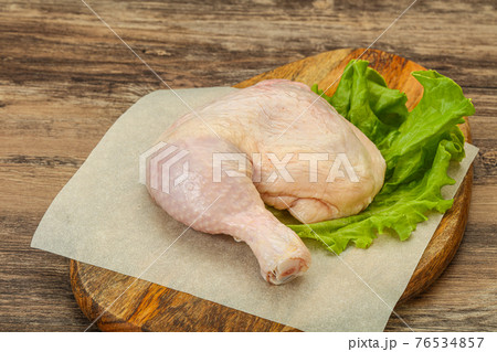 Raw chicken leg for cooking 76534857