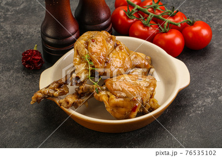 Rabbit stew in spicy sauce 76535102