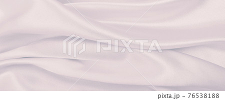 Smooth elegant pink silk or satin texture as wedding background. Luxurious background design Smooth elegant pink silk or satin texture as wedding background. Luxurious background design 76538188