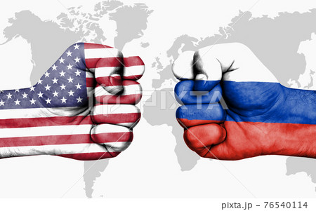 Conflict between USA and Russia - male fists 76540114