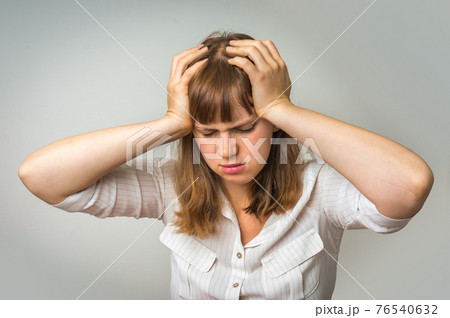 Young disappointed woman in depression 76540632