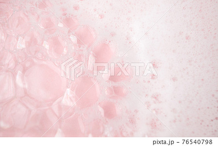 White foam bubbles texture on pink pastel background, copy space, banner for loundry, cleaning service, bathroom concept, clean, wash - liquid soap, shower gel, shampoo 76540798