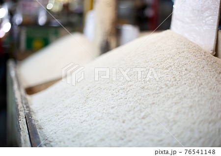 Pile of rice at street market. Outdoors Food marketplace Pile of rice at street market. Outdoors Food marketplace 76541148
