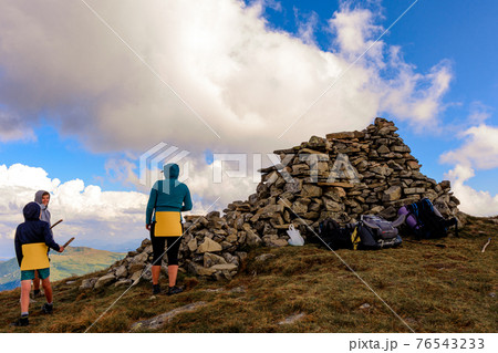 Big happy family on top of the mountain, family trip to the mountains, tourist vacation with children, Carpathian mountains and the top of Menchul mountain. Big happy family on top of the mountain, family trip to the mountains, tourist vacation with children, Carpathian mountains and the top of Menchul mountain. 76543233