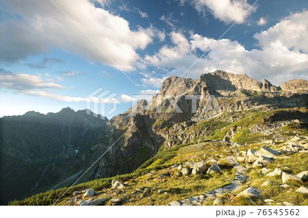 Trail through the Carpathian Mountains during sunrise, Poland Trail through the Carpathian Mountains during sunrise, Poland 76545562