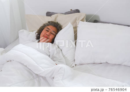 Asian Elderly woman sleep and sweet dream on bed. Asian Elderly woman sleep and sweet dream on bed. 76546904