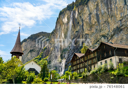 The church and the Staubbach Falls in Lauterbrunnen, Switzerland 76548061