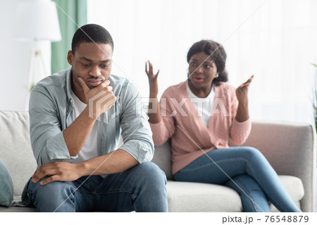 African american couple having quarrel at home 76548879