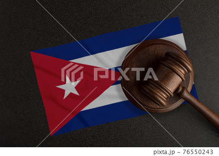 Judges gavel and the flag of Cuba. Law and Justice. Constitutional law Judges gavel and the flag of Cuba. Law and Justice. Constitutional law 76550243