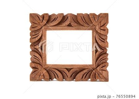 Frontal view of carved wooden photo frame 76550894