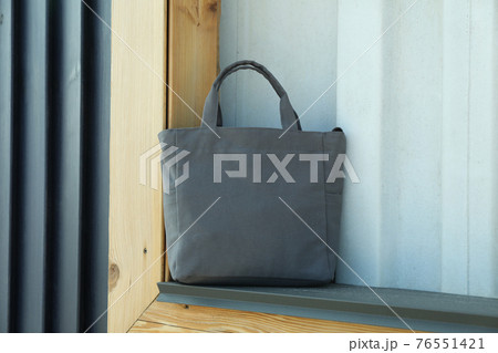 Blank stylish eco bag outdoor, space for text 76551421