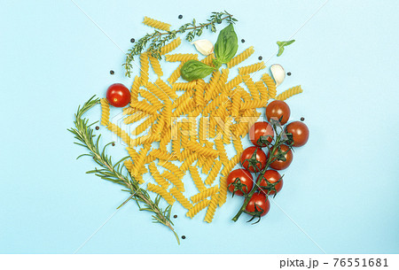 Raw Fusilli Pasta With Tomatoes Herbs And の写真素材