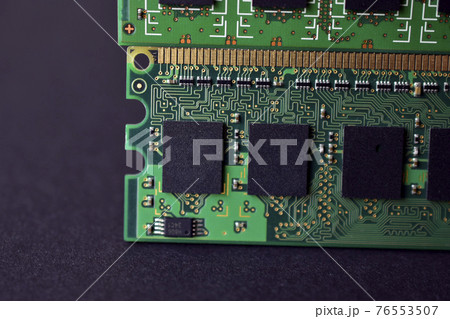 Green computer RAM bars on a black background 76553507