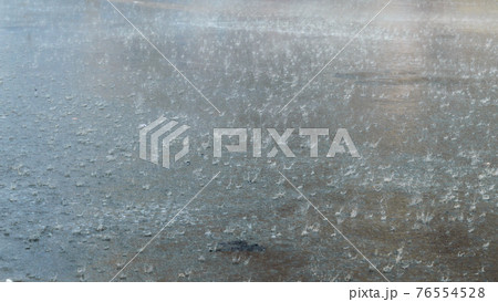 Monsoon rain falling on city street. Beautiful rainy season Nature background image Monsoon rain falling on city street. Beautiful rainy season Nature background image 76554528