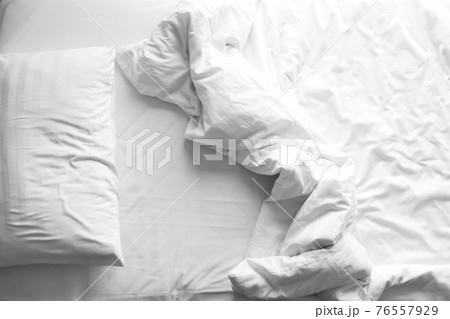Messy bed. Top view with copy space. Messy bed. Top view with copy space. 76557929