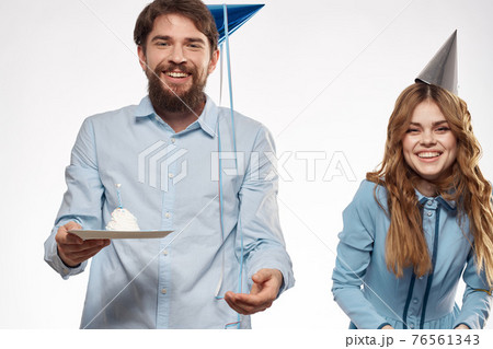 birthday party disco young people with cake and columns fun cropped view close-up birthday party disco young people with cake and columns fun cropped view close-up 76561343