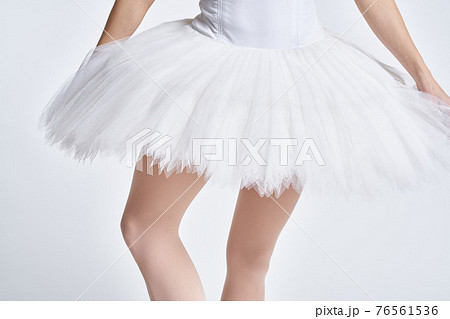 ballerina white tutu dance exercise performance light background 76561536