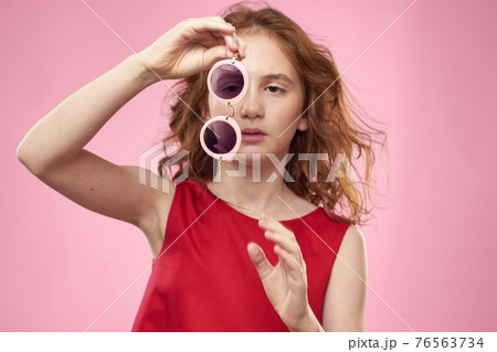 girl with curly hair sunglasses childhood joy pink background girl with curly hair sunglasses childhood joy pink background 76563734
