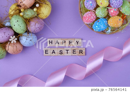 Decorative easter eggs and silk ribbon. Decorative easter eggs and silk ribbon. 76564141