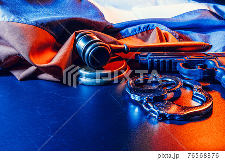 Russian justice. Wooden gavel and russian flag 76568376