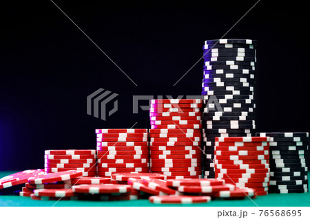 Stacks of playing chips on casino table Stacks of playing chips on casino table 76568695