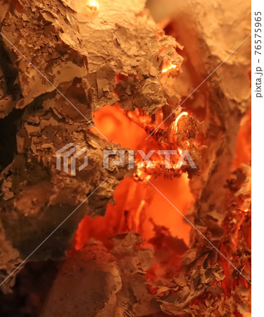 Burnt paper ash in the oven. Burnt paper ash in the oven. 76575965